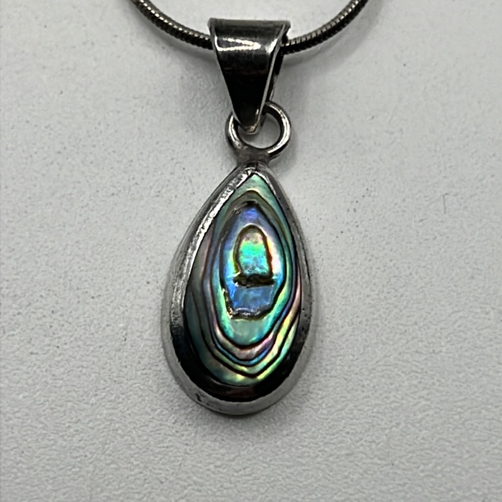 ABALONE AND STERLING SILVER PENDANT ON A STERLING SILVER CHAIN 16”